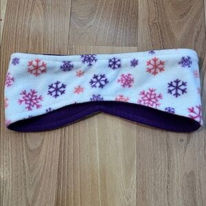 Girls pink and purple winter snowflake headband can be worn in reverse purple